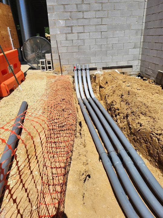 Underground conduits entering a commercial building