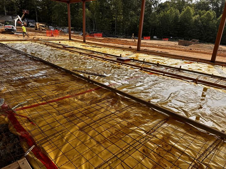 Electrical conduits prepared within a commercial slab