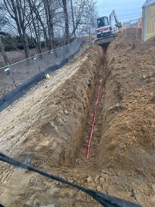 Long prepared trench for underground electrical raceways